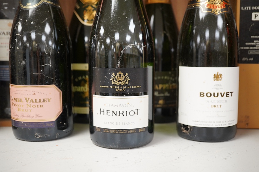 Nine bottles of various champagnes, sparkling wines, ports etc. to include Henriot, Canard-Duchêne, Drappier, Warres, etc. condition - varies externally, storage unknown